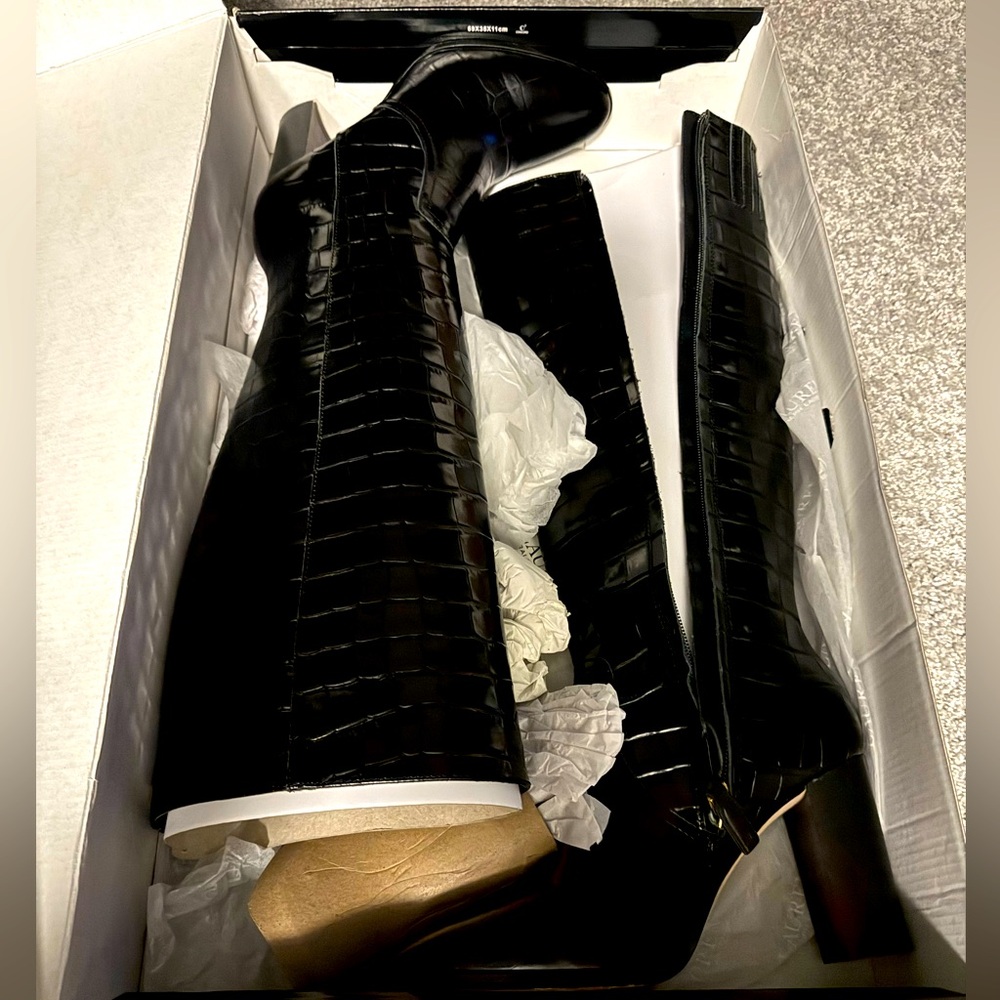 Crocodile embossed black leather boots